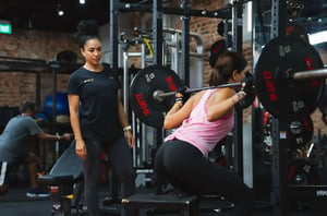 Female Squating heavy weight